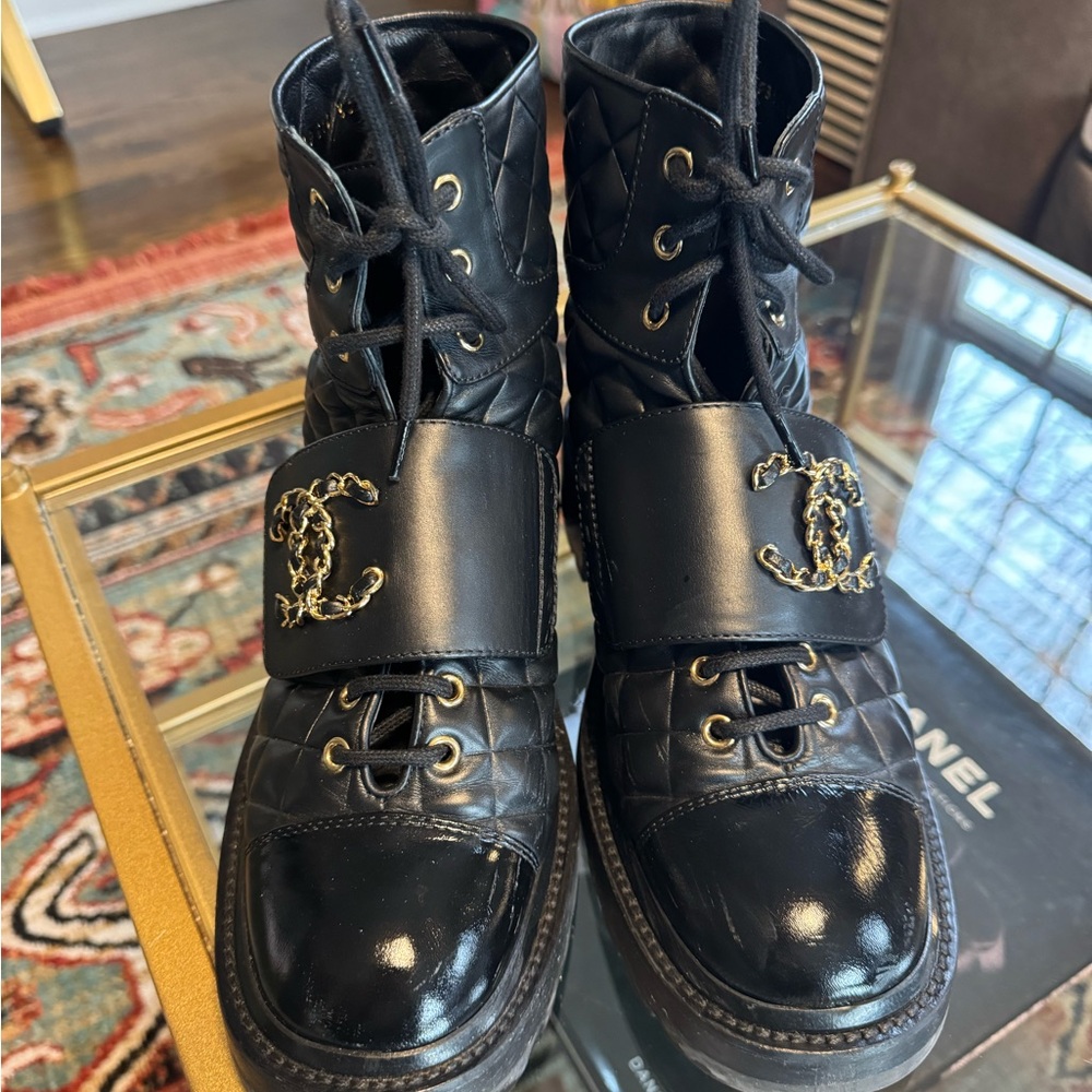 CHANEL Black and Gold Combat Boots